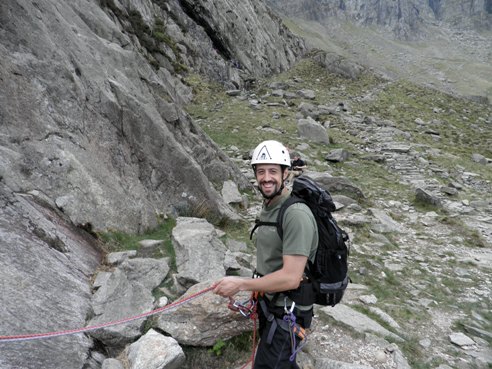 Huw belaying at the start of Charity.